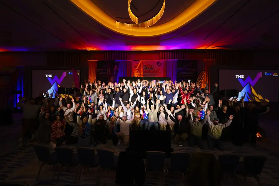 The whole company in one room at Camp Forward '26